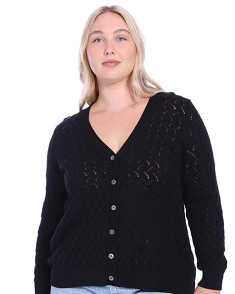 Front of a model wearing a size 3X Cotton Cashmere Pointelle Cardigan in Black by Minnie Rose. | dia_product_style_image_id:325044